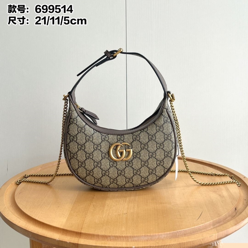 G*u*i top handle bags